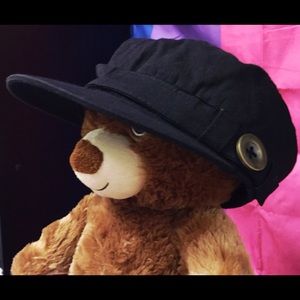 Black hat with gold button